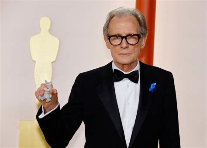 
Bill Nighy carries a murdered Sylvanian bunny on his suit at Oscars 2023 red carpet: Watch 
